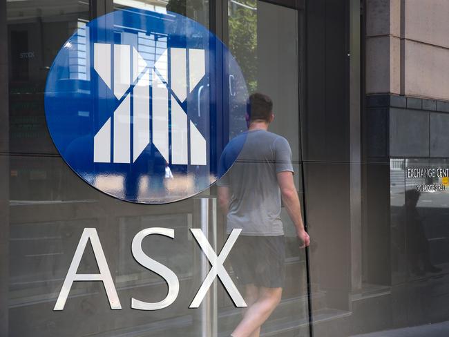 ????SYDNEY, AUSTRALIA : NewsWire Photos - FEBRUARY 24 2025; A general view of people walking past the digital boards of the ASX in the Sydney CBD. Picture: NewsWire/ Gaye Gerard