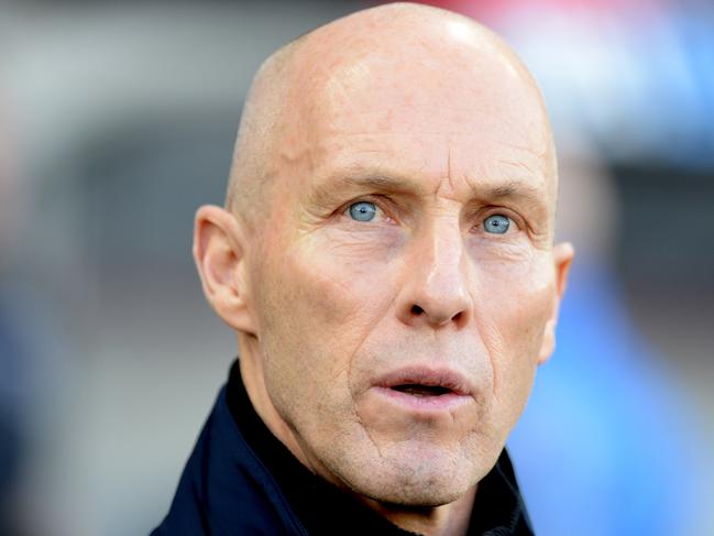 Swansea manager Bob Bradley watches the action during their English Premier League soccer match against West Ham United at the Liberty Stadium, Swansea, Wales, Monday, Dec. 26, 2016. (Simon Galloway/PA via AP)