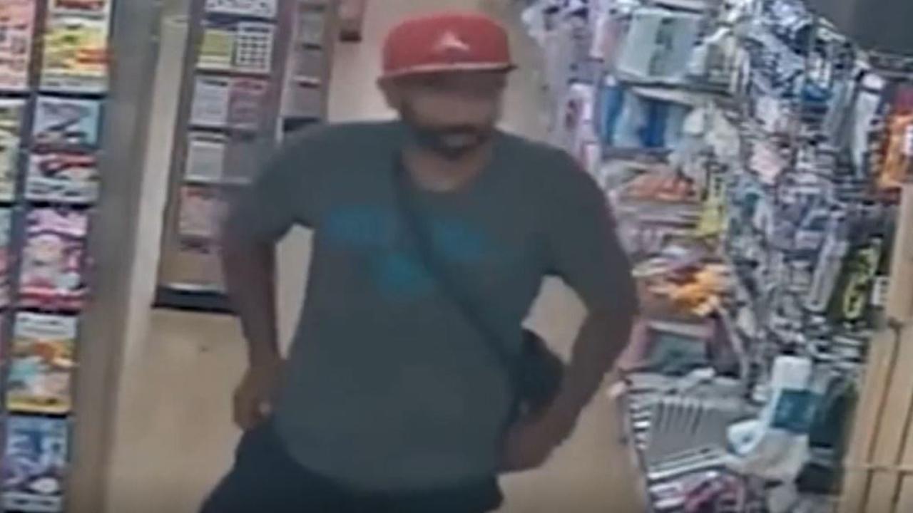 The man was caught on camera attempting to steal items of food. Picture: 7NEWS