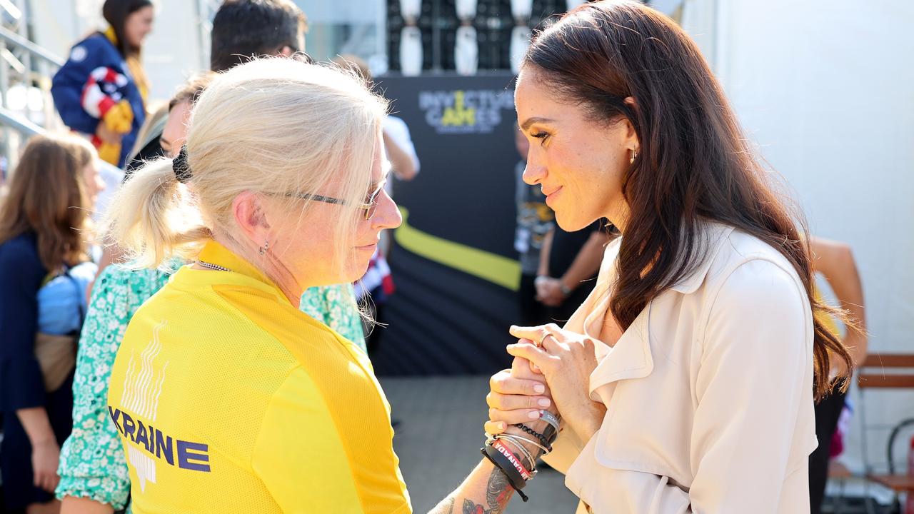 Meghan greets Yuliia 'Taira' Paievska during the Swimming Medals Ceremony during the Invictus Games in Dusseldorf, Germany. Picture: Chris Jackson/Getty Images for the Invictus Games Foundation