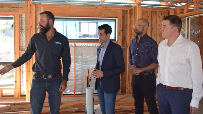 JGK Builders owner John Kay shows Queensland Premier David Crisafulli, Keppel MP Nigel Hutton and Treasurer David Janetzki through one of his businesses new housing project.