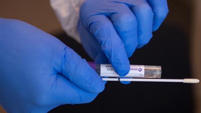 A German doctor prepares to do a coronavirus swab test. Picture: Getty Images