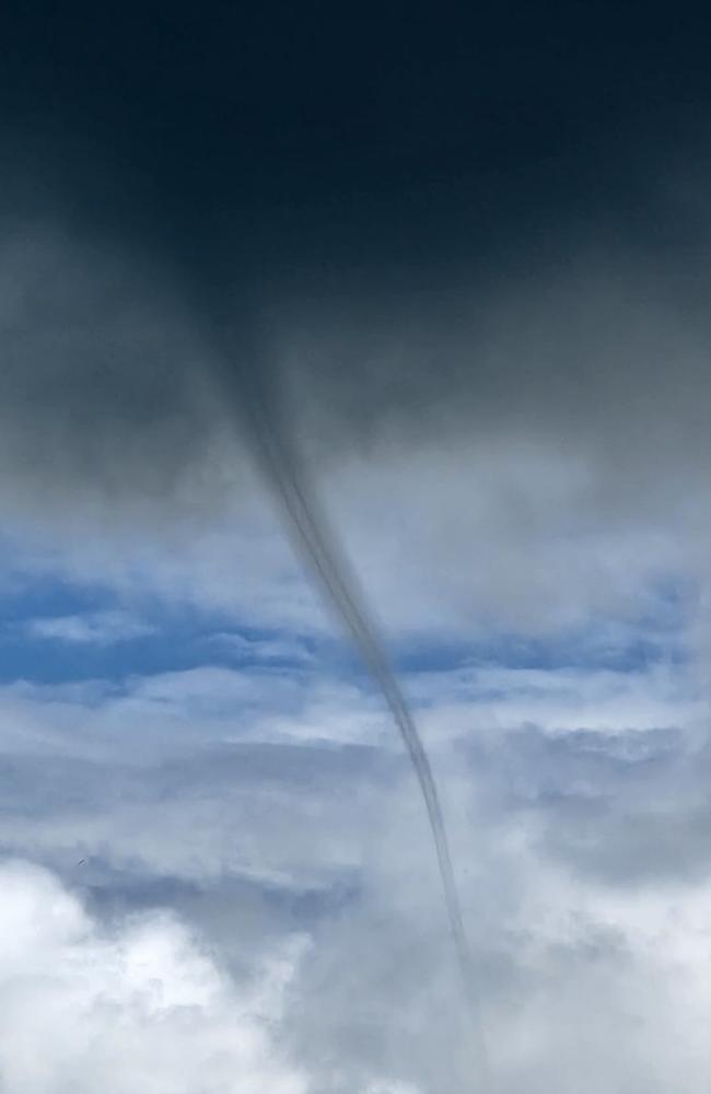 Facebook user Julie Burns shared this photo of a water spout forming over Hideaway Bay in the Whitsundays, January 13, 2023.