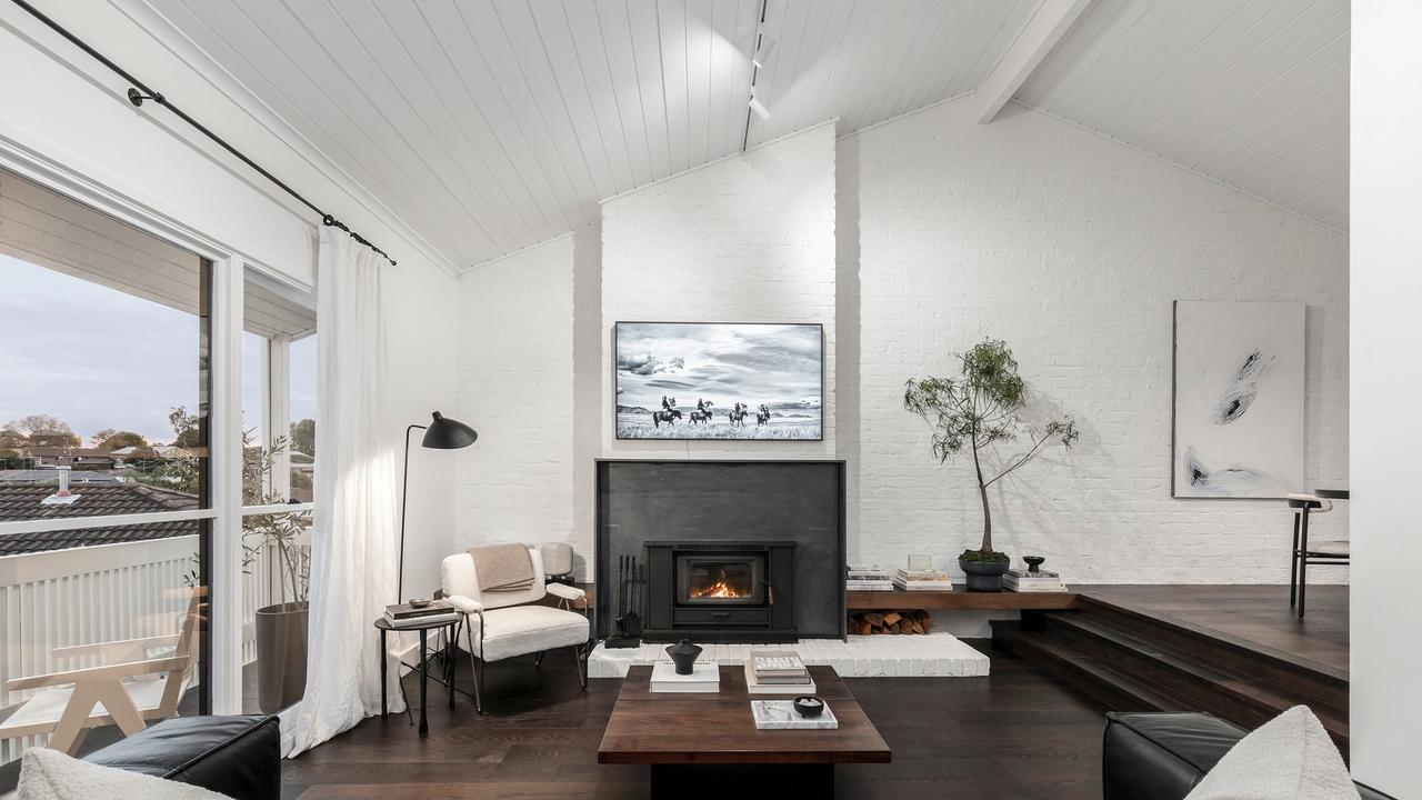 After living room: Buyers will be able to relax by the wood-burning fireplace in the main living room while enjoying the light filled and airy spaces.