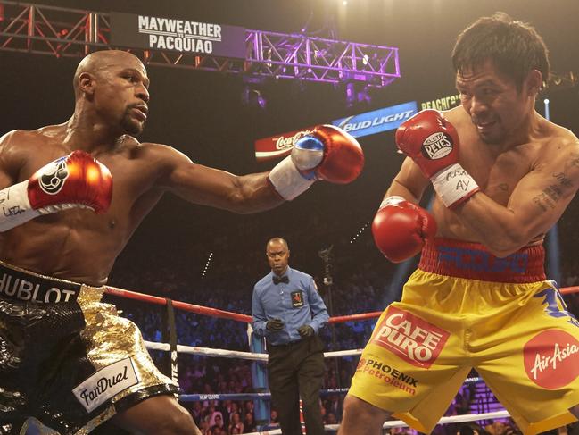 Floyd Mayweather and Manny Pacquiao in their 2015 Fight of the Century at the MGM Grand in Las Vegas. Picture: Robert Beck /Sports Illustrated via Getty Images