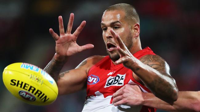Sydney's Lance Franklin and Melbourne's Sam Frost during AFL match between the Sydney Swans and Melbourne Demons at the SCG. Picture. Phil Hillyard