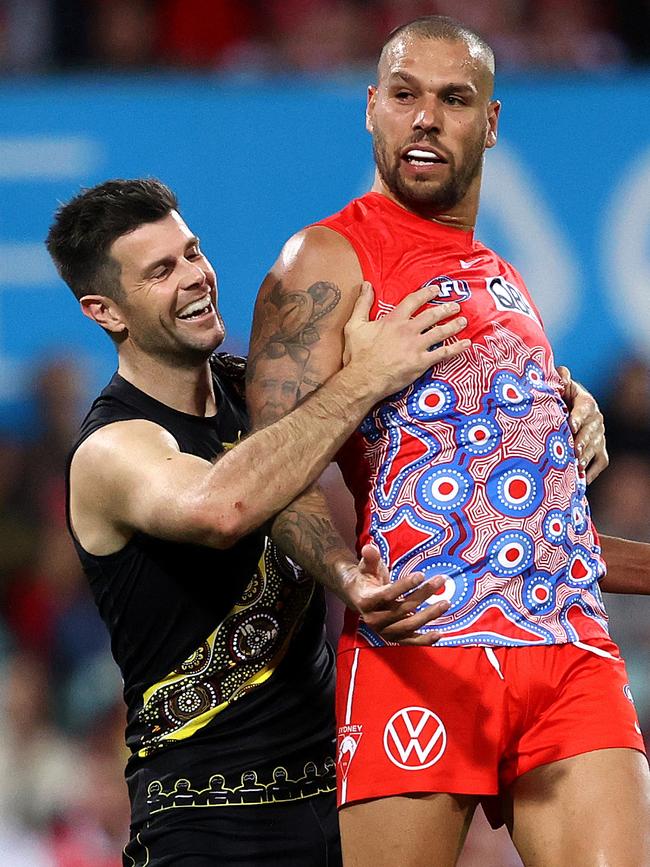 Lance Franklin and Trent Cotchin clash.