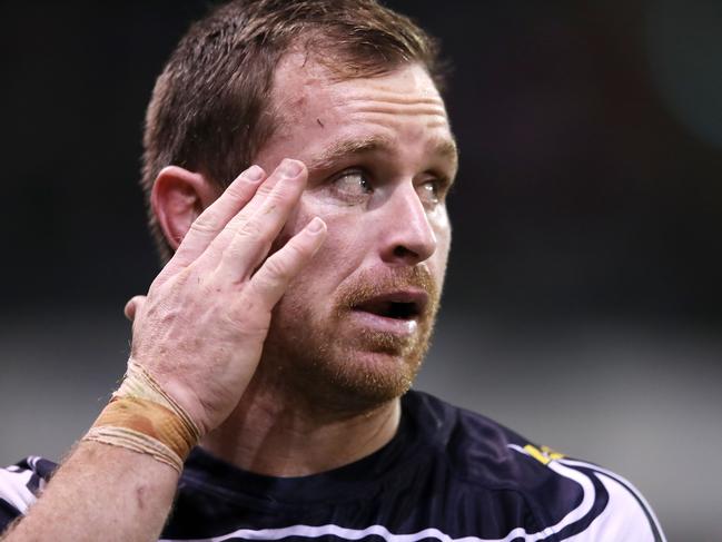 WOLLONGONG, AUSTRALIA - JUNE 28: Michael Morgan of the Cowboys holds his head as he leaves the field during the round 15 NRL match between the St George Illawarra Dragons and the North Queensland Cowboys at WIN Stadium on June 28, 2019 in Wollongong, Australia. (Photo by Mark Kolbe/Getty Images)