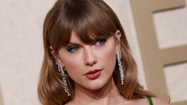 TOPSHOT - US singer-songwriter Taylor Swift arrives for the 81st annual Golden Globe Awards at The Beverly Hilton hotel in Beverly Hills, California, on January 7, 2024. (Photo by Michael TRAN / AFP)