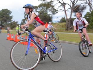 SCHOOLS TRIATHLON CHALLENGE, Bellerive Beach: Mikayla Cooper, of Collegiate competes in the bike leg of the grade 7 individual girls section