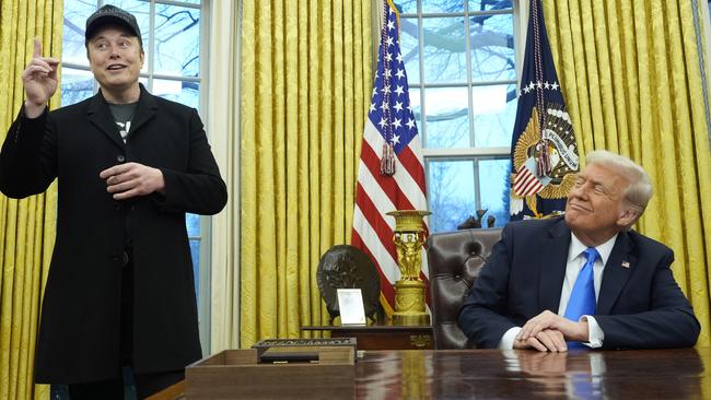 Donald Trump listens as Elon Musk speaks in the Oval Office. Picture: AP.