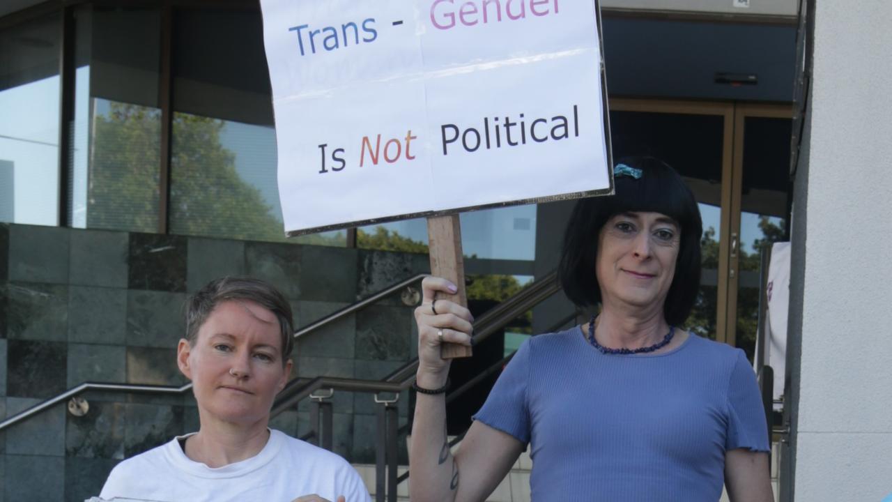 Renee Lees and Wendy Ramsey rallying outside Cairns Electoral Commission, protesting against LGBTQI hate in the political landscape. Picture: Georgia Clelland.