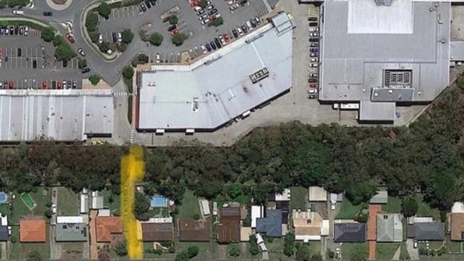 The yellow mark signifies the open laneway between the Victoria Point shopping centre and the residential estate. Pictures: Contributed