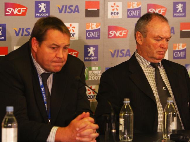 Hansen (L) and Graham Henry (R) face the music after the All Blacks lost to France in the quarter-finals of the 2007 World Cup. Picture: Stu Forster/Getty Images