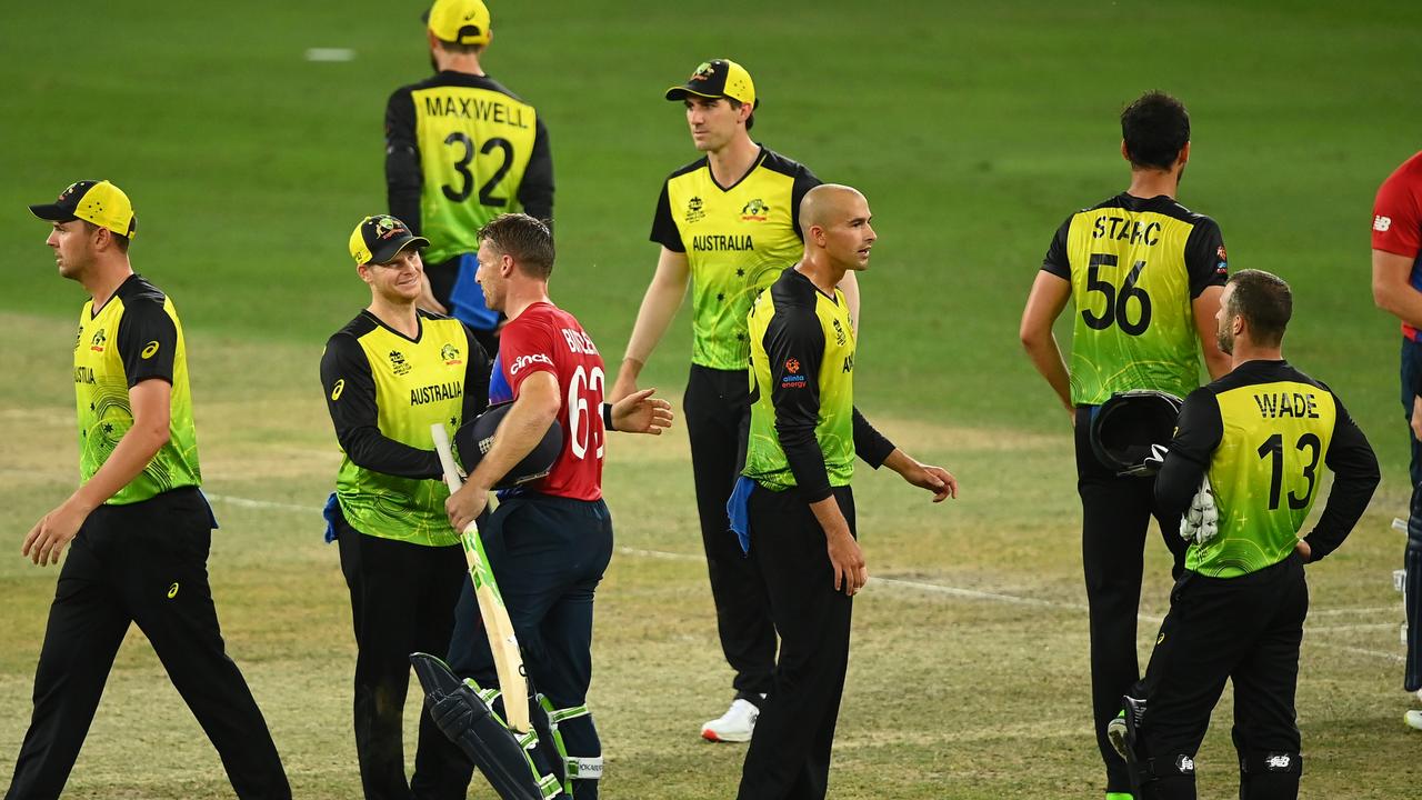 Jos Buttler of England and Steve Smith of Australia interact following the ICC Men's T20 World Cup match