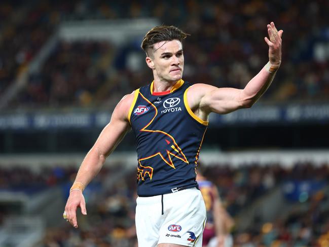 Ben Keays of the Crows gestures to the crowd. Picture: Chris Hyde/AFL Photos/via Getty Images.