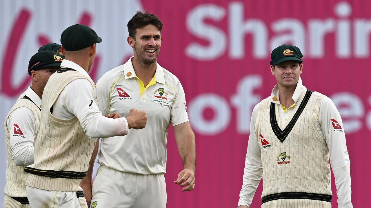 Australia's Mitchell Marsh (C) is having a monster game with bat and ball. Picture: Getty