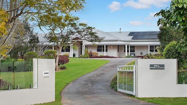 This Samford Valley homestead on 1.8 acres has a pool and stables