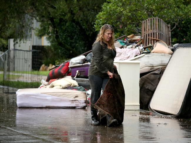 Heavy rain continues to batter the NSW mid north coast causing major flooding. Clean up of flood devastation at Telegraph Point north of Port Macquarie. Krysia Mailo. Nathan Edwards