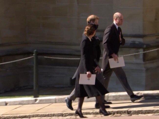 Kate, Prince William and Prince Harry walk together after the funeral of Prince Philip. Picture: BBC