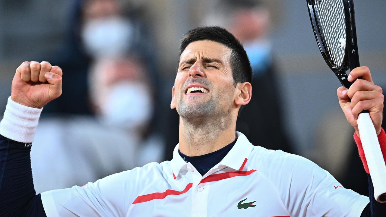 Novak Djokovic celebrates after winning against Spain's Pablo Carreno Busta.