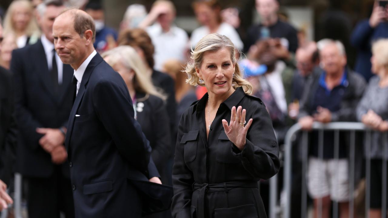 Prince Edward, Earl of Wessex, and Sophie, Countess of Wessex view floral tributes for the late Queen Elizabeth II during a visit to Manchester. (Photo by Cameron Smith/Getty Images)