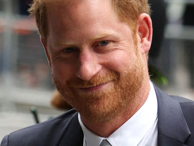 TOPSHOT - Britain's Prince Harry, Duke of Sussex, waves as he arrives to the Royal Courts of Justice, Britain's High Court, in central London on June 7, 2023. Prince Harry testified he had suffered lifelong "press invasion" and that some media had blood on their hands, as he became the first British royal in more than 100 years to give evidence in court. (Photo by Adrian DENNIS / AFP)