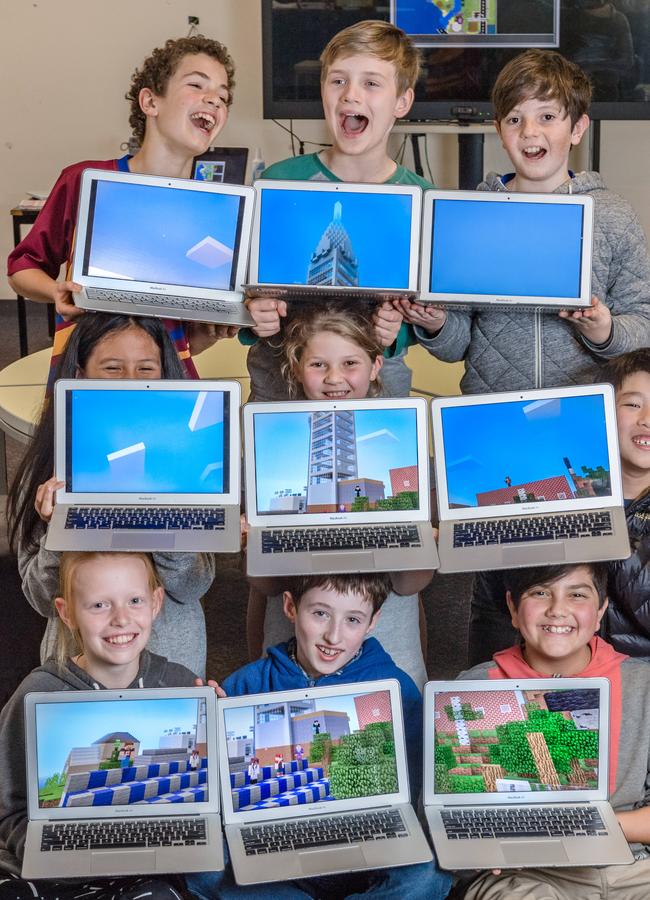 Fitzroy North students Ben, Oli, Andrew, Josephine, Sunday, Alex, Piper, Edward and Sidney are happy to play Minecraft. Picture: Jason Edwards