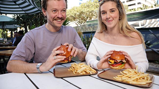 Dan Nicholas and Georgia Bounds at Greenwood Hotel, which has been nominated for the Australian Hotel Association Best Burger competition. Picture: Adam Yip