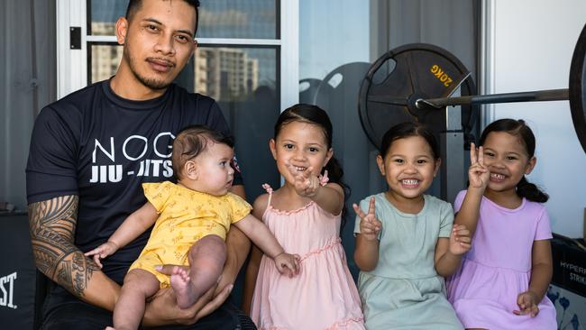 Caleb Vaele at his home in Cairns with daughters Kyra, Kahna, Karae and Keturah. Picture: Emily Barker