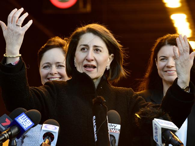 NSW Premier Gladys Berejiklian (centre) gestures with her hands during a press conference in front of the new M4 WestConnex tunnel in Homebush, Sydney, Friday, July 12, 2019. The new M4 WestConnex Tunnel will open on Saturday, July 13. (AAP Image/Bianca De Marchi) NO ARCHIVING