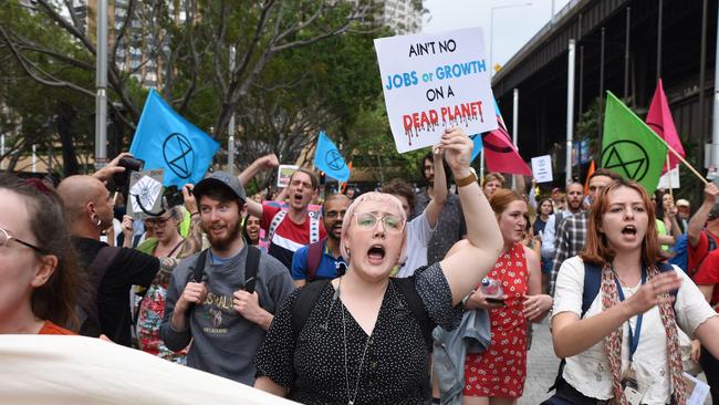 Extinction Rebellion protesting on George St on Friday evening. Picture: Flavio Brancaleone