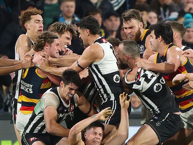 Tempers flare in the Showdown after Dan Houston cleaned up Izak Rankine. Picture: Sarah Reed/AFL Photos via Getty Images.