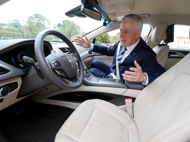 Deputy Prime Minister Michael McCormack takes a ride in a driverless car at the Torrens Parade Grounds in Adelaide, Thursday, November 1, 2018. (AAP Image/Kelly Barnes) NO ARCHIVING