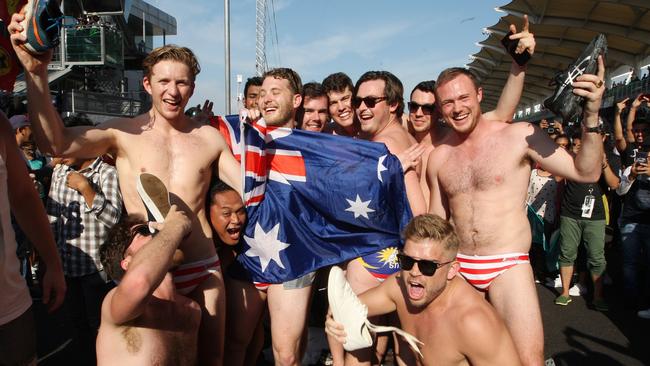 The Budgie Nine not long before they were arrested at the Formula 1 Grand Prix in Sepang, Malaysia. Picture: AP.