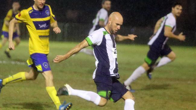 Matt Hilton heading goalwards for Murwillumbah. Photo: Richard Gosling