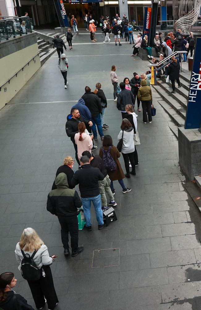 People queuing outside Sydney Passport Office earlier this week. Picture: Justin Lloyd.