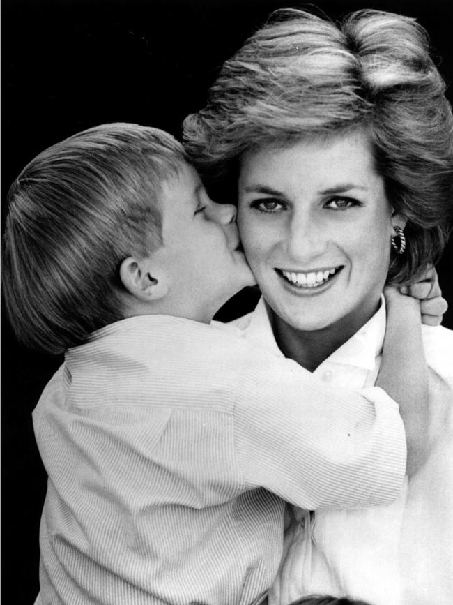 Prince Harry, 5, kissing his mother Diana, Princess of Wales in 1990.