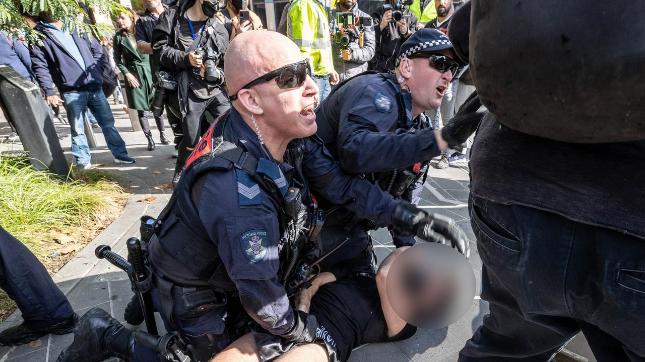 Victoria Police clash with protesters at an anti immigration rally in Melbourne. Picture: Jake Nowakowski