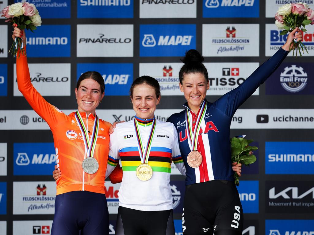 Gold medallist Grace Brown (C) alongside Demi Vollering and Chloe Dygert. Picture: Getty