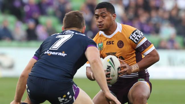 Anthony Milford runs the ball for the Broncos against the Storm. Picture: AAP