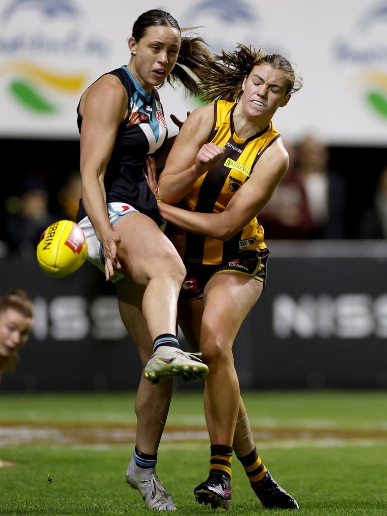 South Adelaide product Indy Tahau (left) in AFLW action for Port Adelaide against Hawthorn. Picture: Jonathan DiMaggio/AFL Photos/via Getty Images