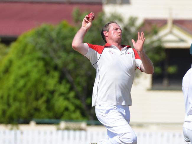 John Cleary on the way to taking four wickets for Warwick Hotel Colts in the preliminary final at Slade Park.