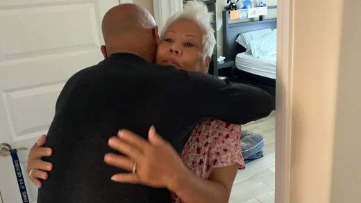 The emotional moment Mr Fry hugged his mum for the first time in almost 50 years. Picture: Supplied