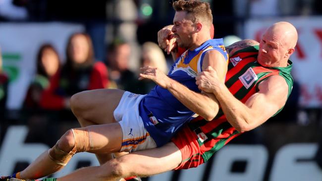 Barry Hall lays a big tackle. Picture: Alex Coppel