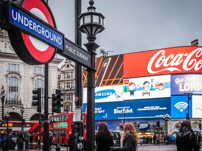 Tourists walk around Piccadilly Circus, London, at Christmas time, before the global pandemic. Picture: Istock