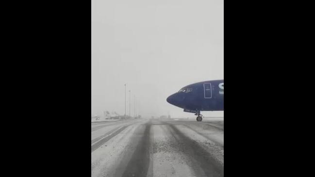 Crews Clean Up Snow At Denver Airport | The Advertiser