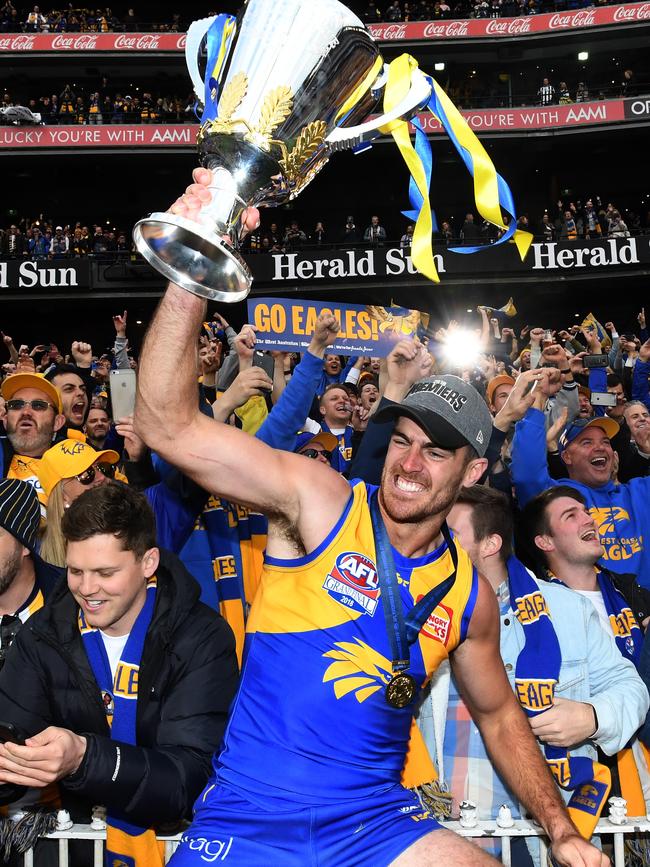 Scott Lycett celebrates with the premiership cup. Picture: AAP Image/Julian Smith