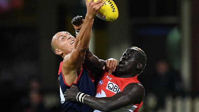 Aliir Aliir attempts to spoil Braydon Preuss. Picture: AAP