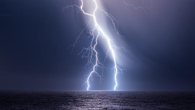 The storm cell unleashes its pent-up energy. Picture: Will Eades